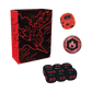 A boxed set of red and black polyhedral dice displayed on a plain white background, including a black box with red line art, a red die showing an 'ex' symbol, a red coin-style die, and several black 10-sided dice with red numbering.